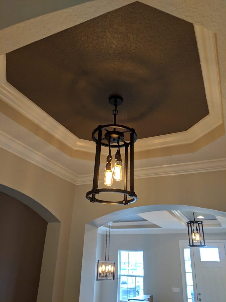Brown tray ceiling in foyer