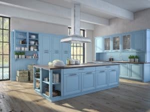 A large kitchen with light blue painted kitchen cabinets.